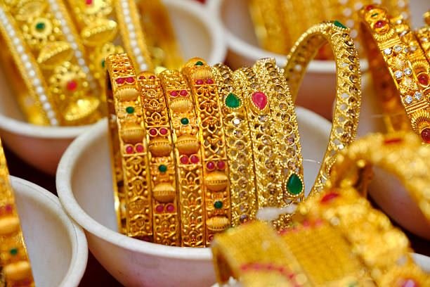 Gold bangles close-up stack