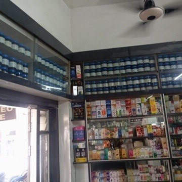 Shelves of homeopathic medicines inside Anand Homeo Care clinic, Lalbagh