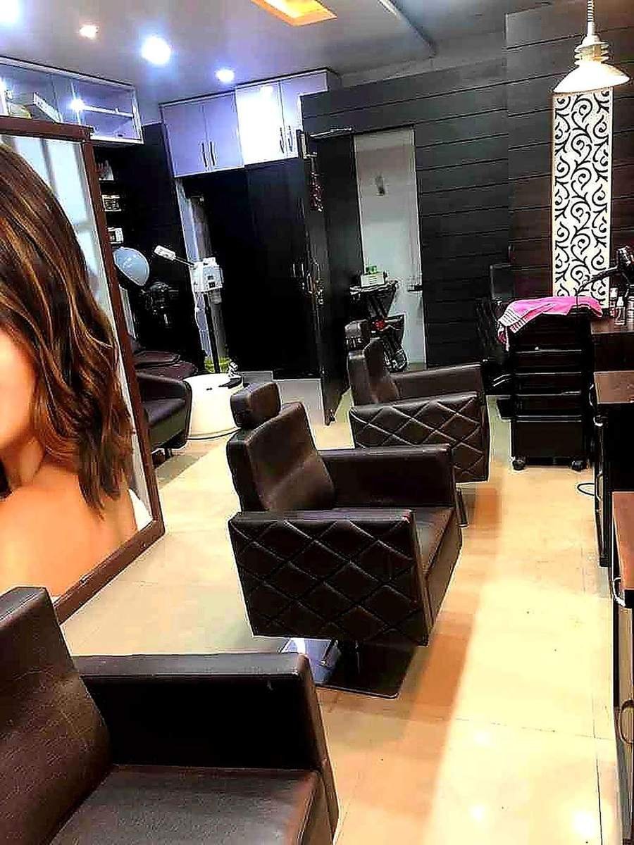Apple Beauty Salon interior seating and mirrors Lucknow