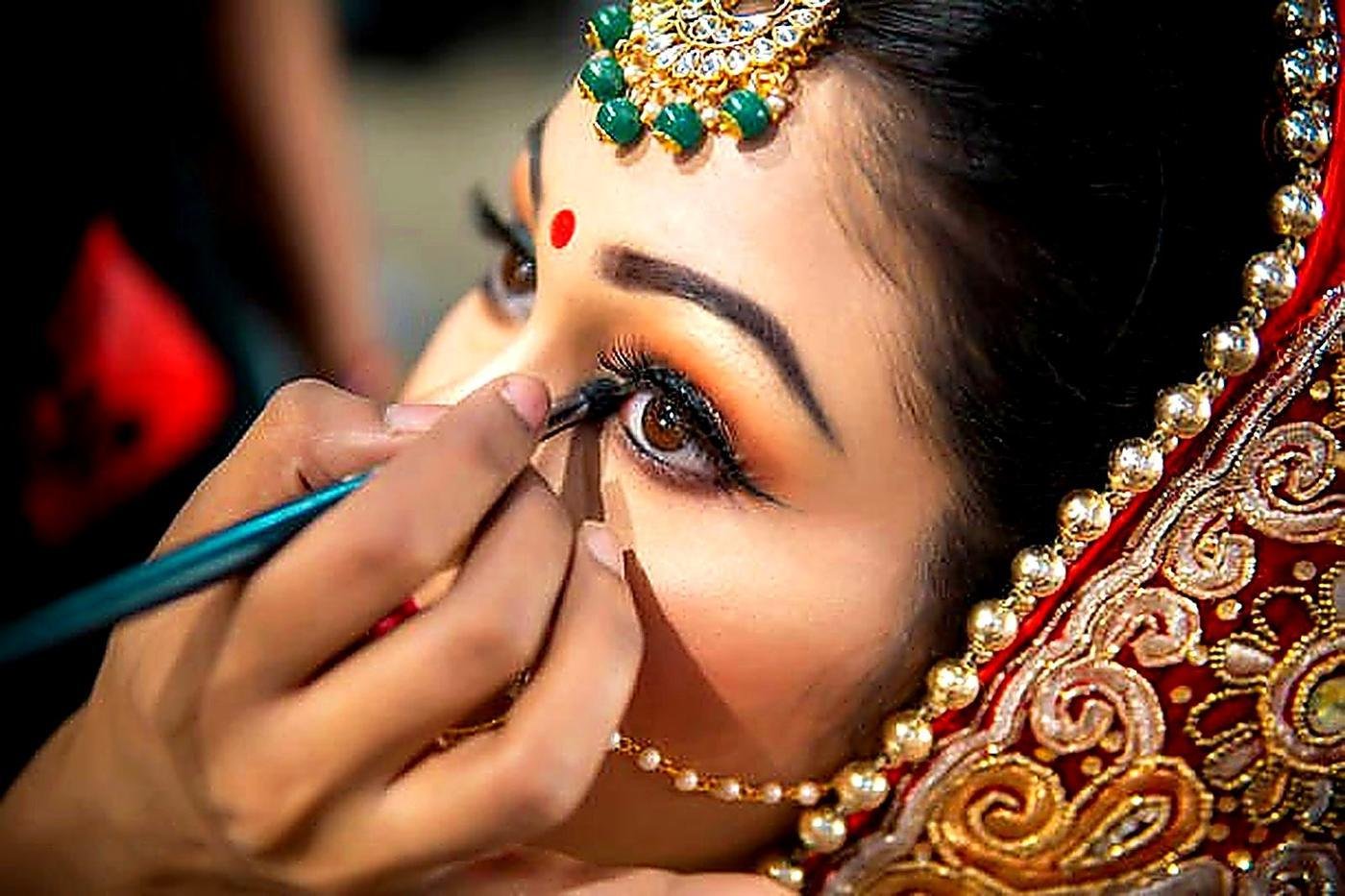 Bridal eye makeup application close-up at Lucknow salon