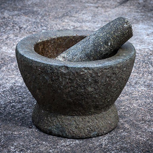 Traditional stone mortar used for grinding herbal medicine
