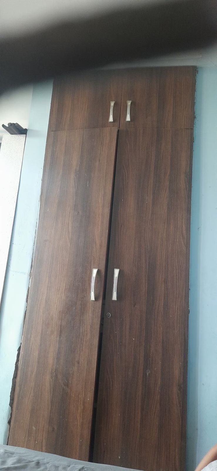 Wooden wardrobe installed by Furnext Decor in Indira Nagar, Lucknow