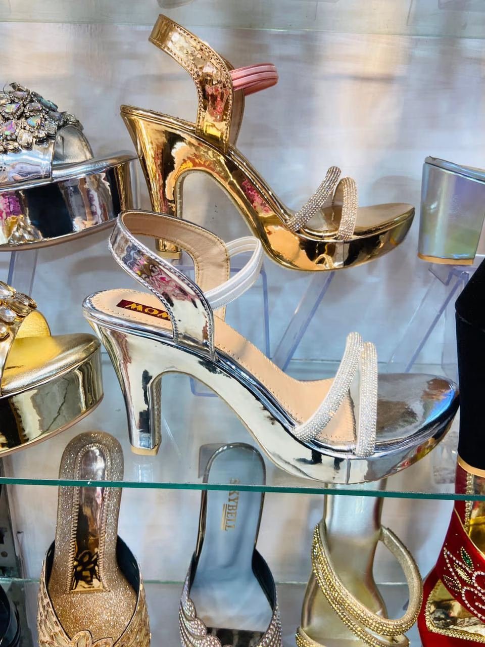 Gold and silver party heels close-up at Heels Gallery
