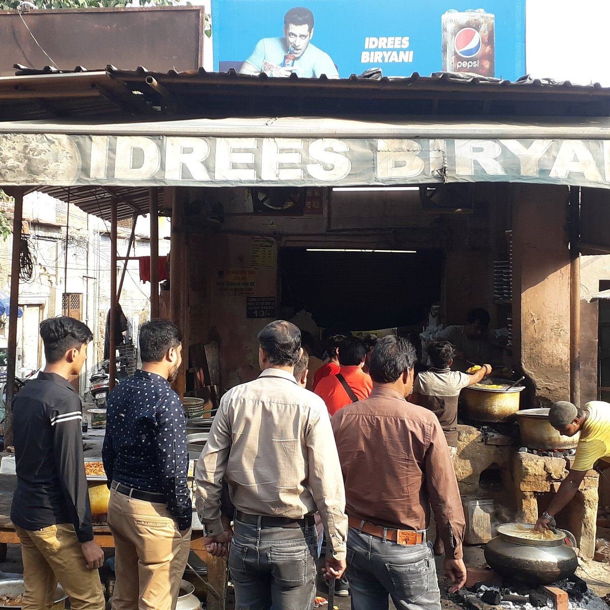 Idrees Biryani shopfront with handis on coal, Chowk Lucknow