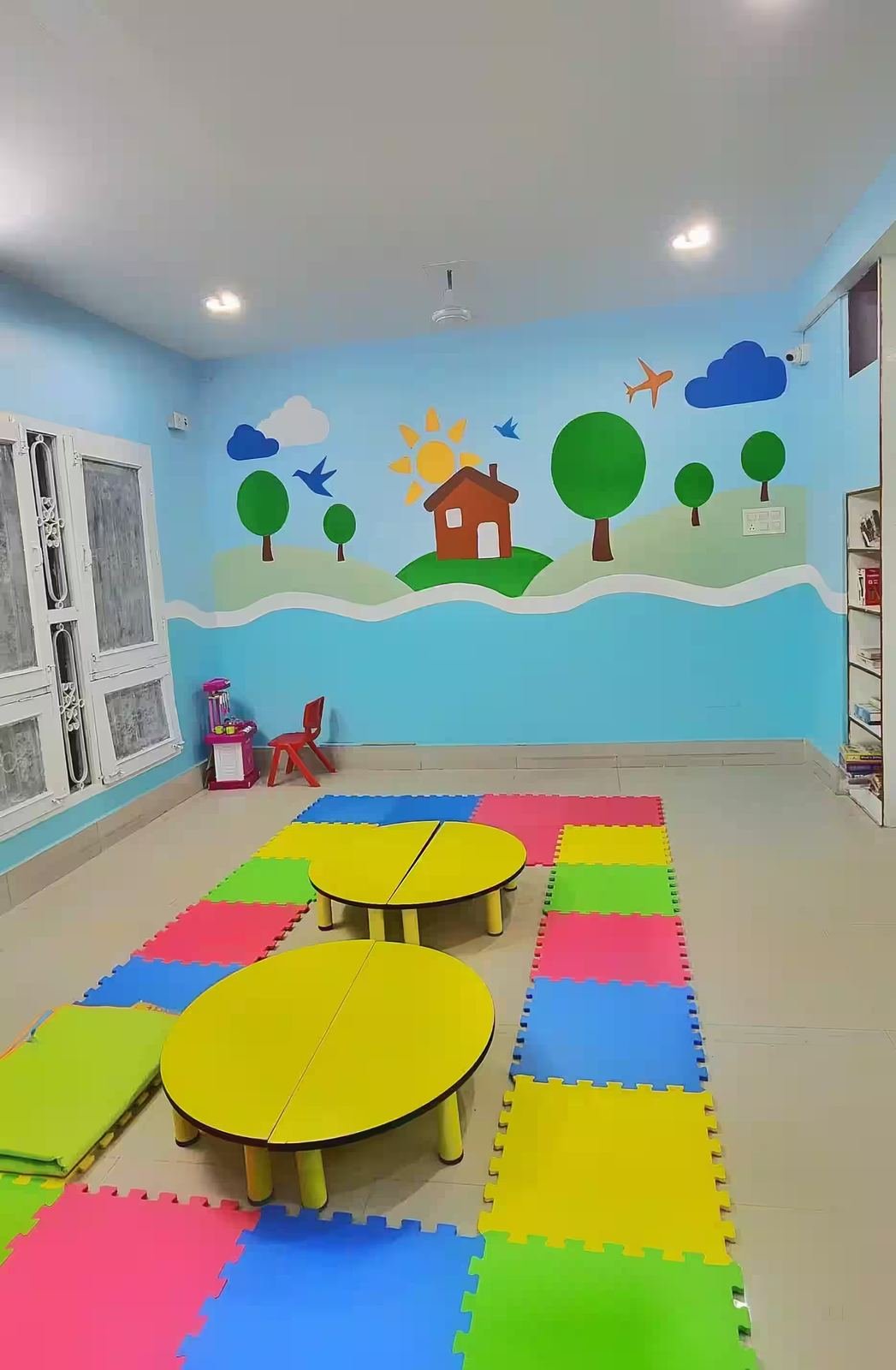 Bright and colorful preschool classroom at Kidspark Preschools Alambagh