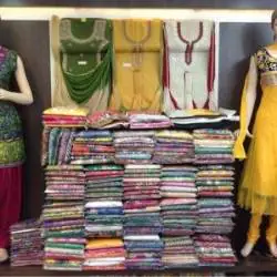 Colourful suit piece display inside Lena Dena Aminabad