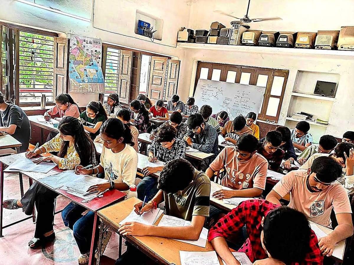 Students writing a practice test in the examination hall