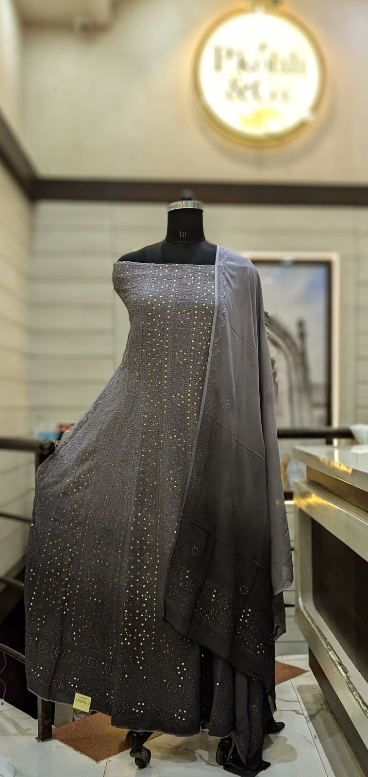 Mukaish work suit piece on mannequin at P. Kohli & Co