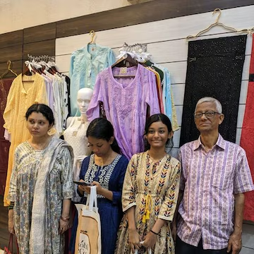 Customers browsing kurti racks at P. Kohli & Co Hazratganj