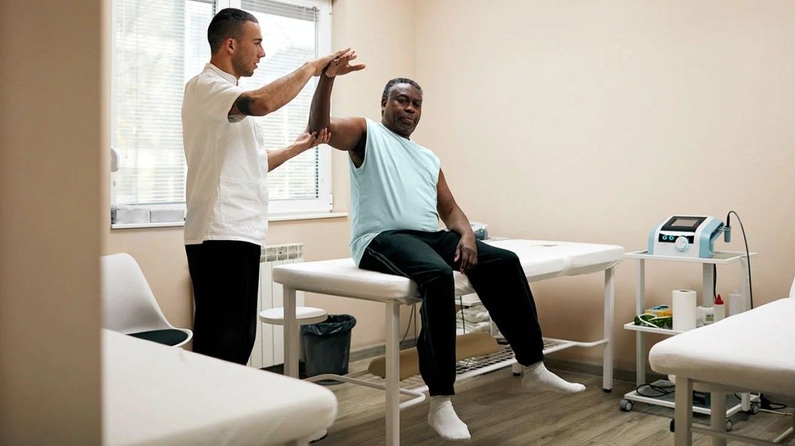 Shoulder mobility rehab with therapist