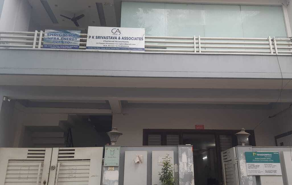 P K Srivastava and Associates office building front with firm signboard, chartered accountant in Lucknow