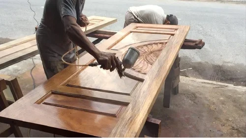 Spray polish finishing on carved door — Sahanawaz Carpainter House, Kakori, Lucknow