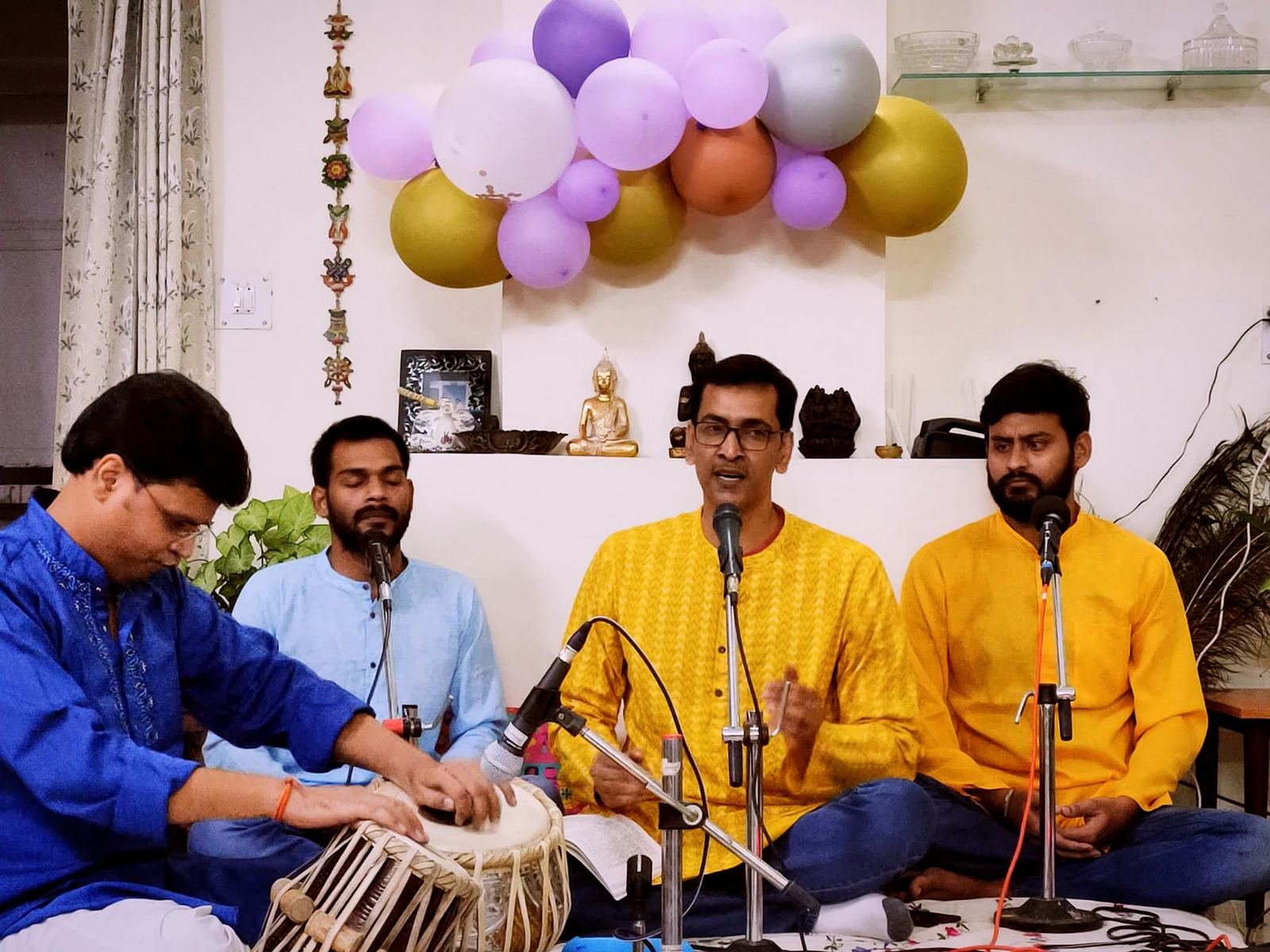 Students of Sangeet Kamal Sansthan singing in a group with tabla at the Bhitauli music class