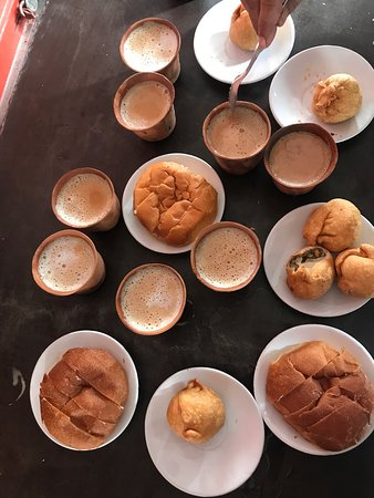 Bun maska and kulhad chai overhead shot — Lalbagh tea stall Lucknow