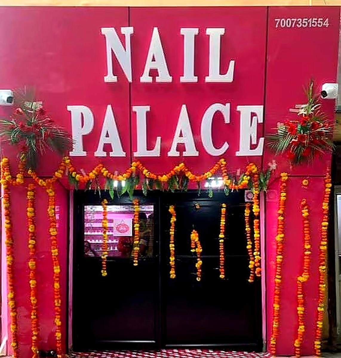 The Nail Palace storefront with marigold decor, Charbagh Lucknow