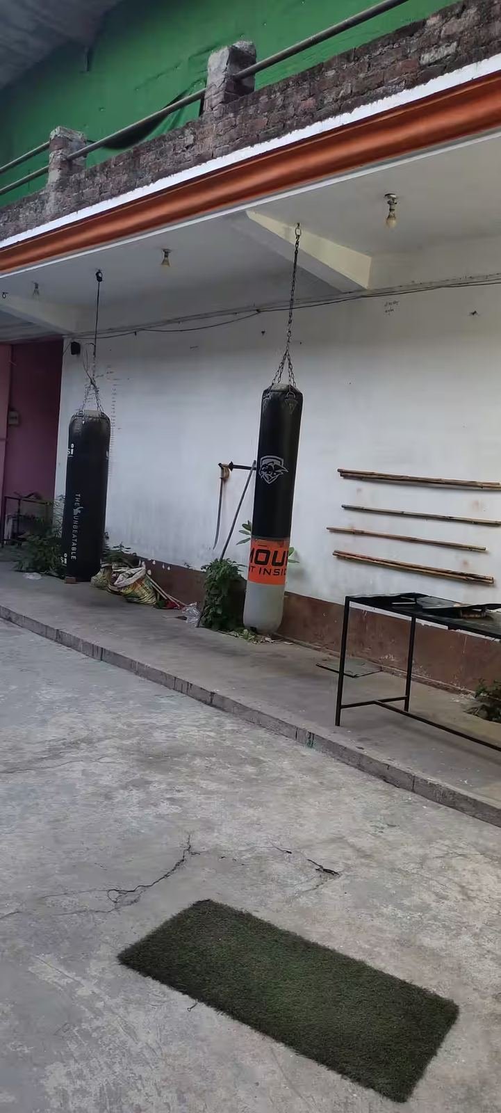 Training area with punching bags at Tigers Club