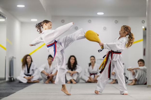 Kids taekwondo kick training