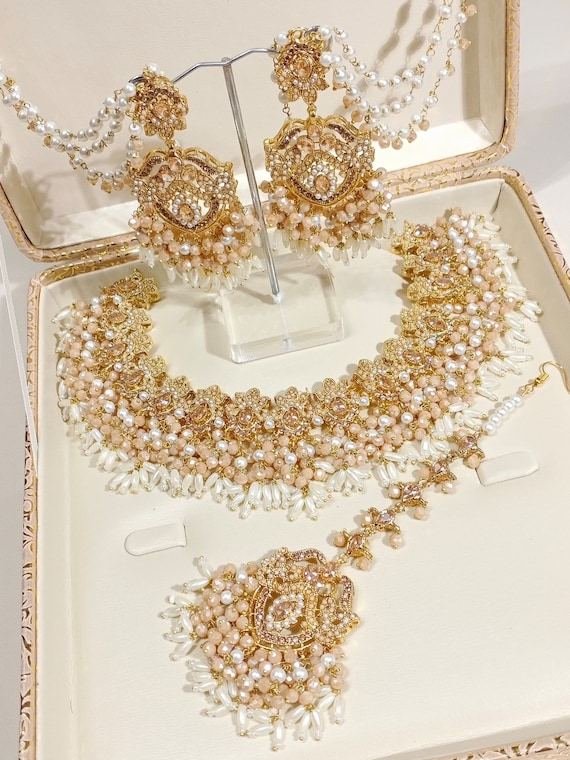 Gold and pearl bridal necklace set in presentation box
