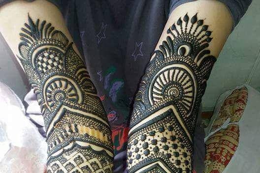 Full-arm bridal mehndi design by Vinod Mehendi Artist, Alambagh Lucknow