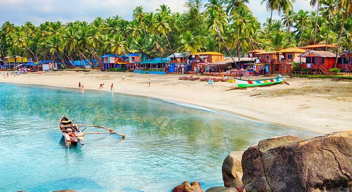 Goa beach with palm huts and boats, honeymoon package by Yarana Tours, travel agent Lucknow